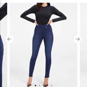 Good American Jeans Size 6-12 with stretch. Very comfy jeans. Dark blue